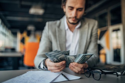 businessman working and counting money