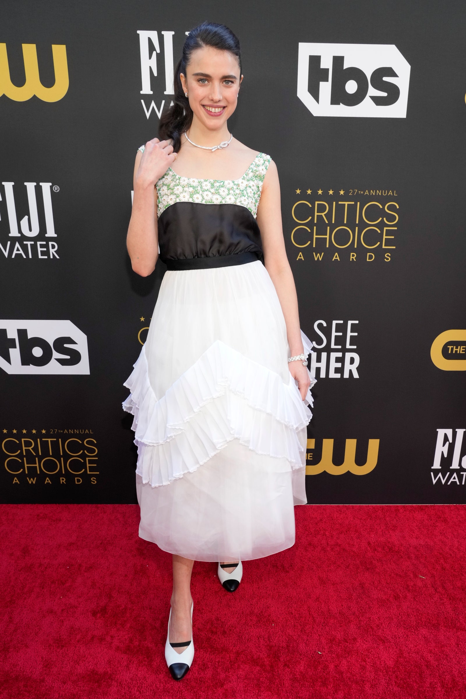 Margaret Qualley red carpet ponytail white skirt