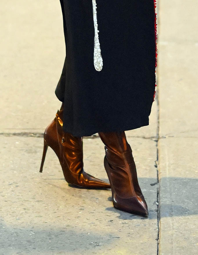 A closer look at Sandra Bullock's copper boots while in New York City on March 14, 2022. 
