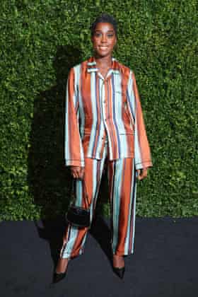 Lashana Lynch all-in Stripe at the Charles Finch and Chanel 2022 Pre-BAFTA Party
