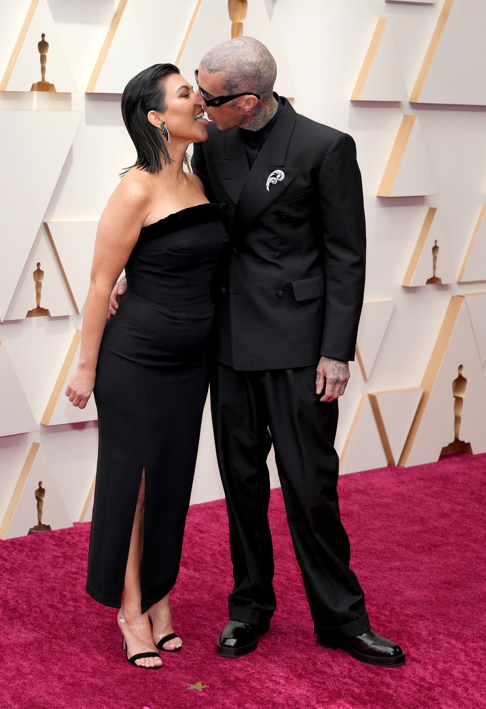HOLLYWOOD CALIFORNIA  MARCH 27  Kourtney Kardashian and Travis Barker attend the 94th Annual Academy Awards at Hollywood...