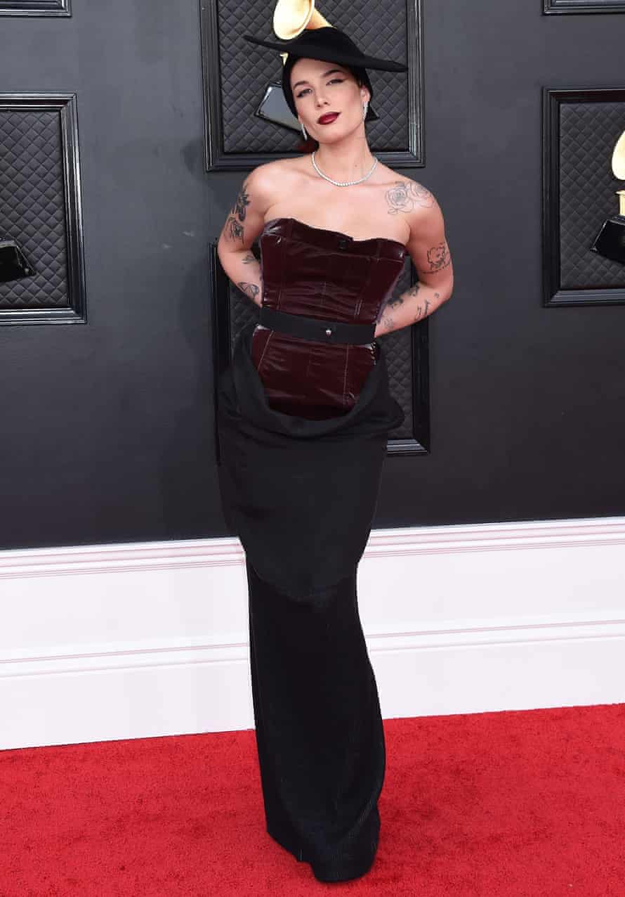 From surgery to the red carpet: Halsey in a deep burgundy corset.