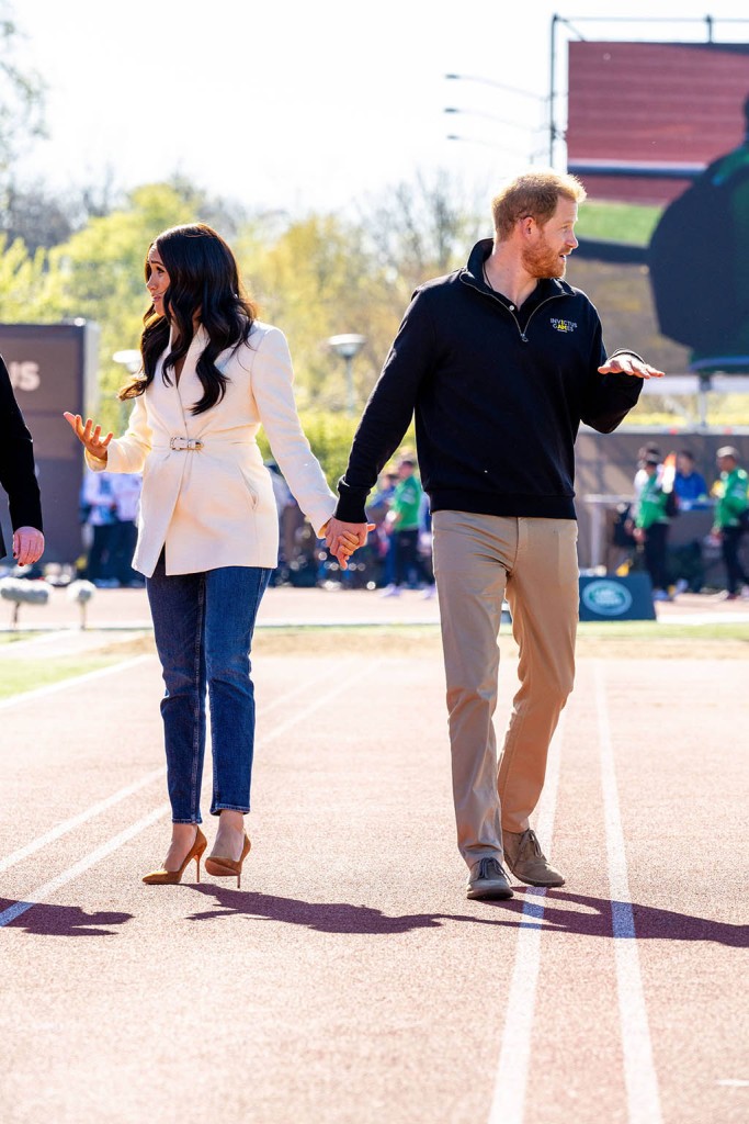 Prince Harry, Duke of Sussex and Meghan Markle, Duchess of Sussex at the Invictus Games at Zuiderpark in The Hague. 17 Apr 2022 Pictured: Prince Harry, Duke of Sussex and Meghan Markle, Duchess of Sussex at the 5th edition of the Invictus Games at Zuiderpark in The Hague. Photo credit: MEGA TheMegaAgency.com +1 888 505 6342 (Mega Agency TagID: MEGA849034_015.jpg) [Photo via Mega Agency]