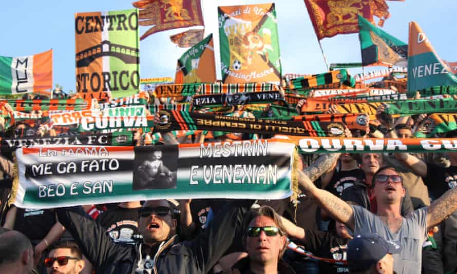 Venezia fans with banngers at Pier Luigi Penzo stadium.