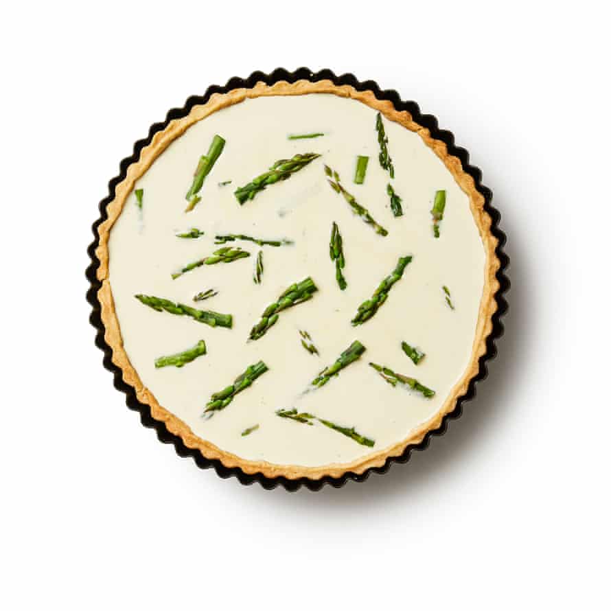 Felicity Cloake’s asparagus tart 9a. Arrange the asparagus spears in the tart case, cover with the filling.
