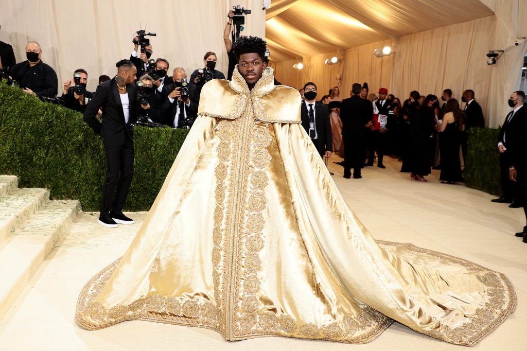 Lil Nas X in a gold cape at the Met Gala.