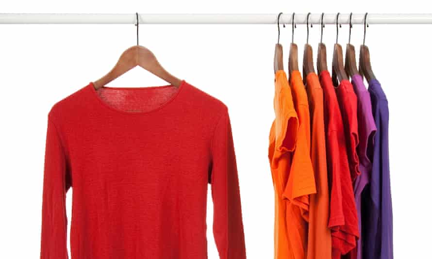 T-shirts on wooden hangers