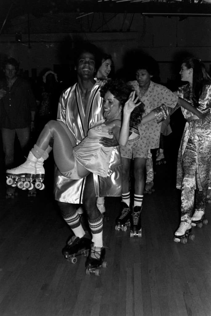 roller skating, roller skating 1980s, disco roller, roller disco, Brooke Shields (R) skates during an event at the Roxy, a roller-skating rink in New York City, on March 14, 1980.