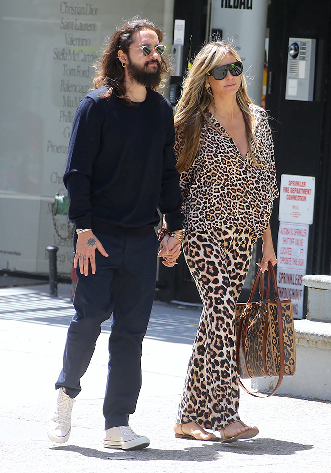 Heidi Klum thong sandals wearing all leopard fashion having lunch with her husband Tom Kaulitz at Cipriani restaurant then walking around Soho, New York City, NY, USA on June 28, 2022. Photo by Dylan Travis/ABACAPRESS.COMPictured: Heidi Klum,Tom KaulitzRef: SPL5322636 280622 NON-EXCLUSIVEPicture by: AbacaPress / SplashNews.comSplash News and PicturesUSA: +1 310-525-5808London: +44 (0)20 8126 1009Berlin: +49 175 3764 166photodesk@splashnews.comUnited Arab Emirates Rights, Australia Rights, Bahrain Rights, Canada Rights, Greece Rights, India Rights, Israel Rights, South Korea Rights, New Zealand Rights, Qatar Rights, Saudi Arabia Rights, Singapore Rights, Thailand Rights, Taiwan Rights, United Kingdom Rights, United States of America Rights