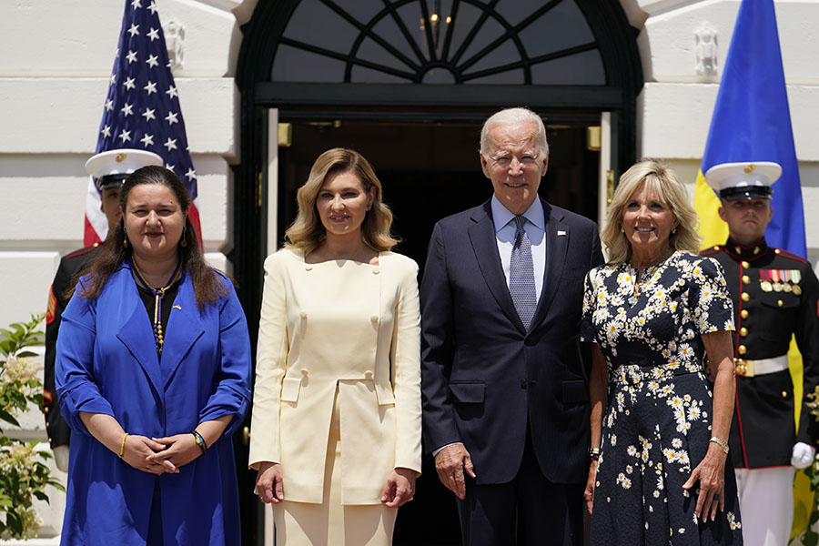 President Joe Biden and first lady Jill Biden, greet Olena Zelenska, spouse of Ukrainian's President Volodymyr Zelenskyy and Ukraine's Ambassador to the United States, Oksana Markarova, left, at the White House in Washington, Tuesday, Jan. 19, 2022. (AP Photo/Andrew Harnik)