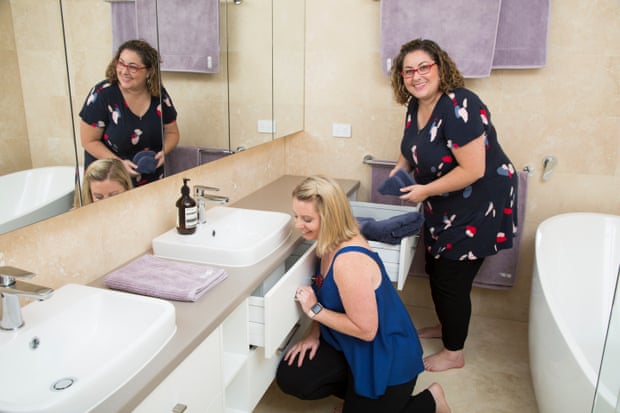 Even bathrooms need organising. The Art of Decluttering’s Amy and Kirsty at work.