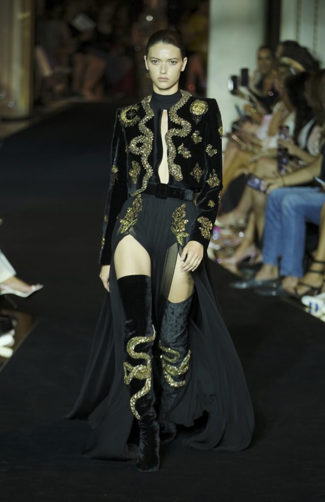 Zuhair Murad Haute Couture Fall Winter 2022/2023 runway look in Paris showcasing stunning couture gold embroidery. (Photo by Laurent Viteur/WireImage)