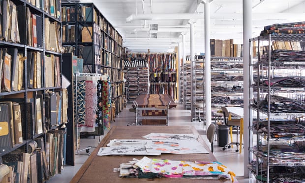 Shelves full of swatch books at the Design Library