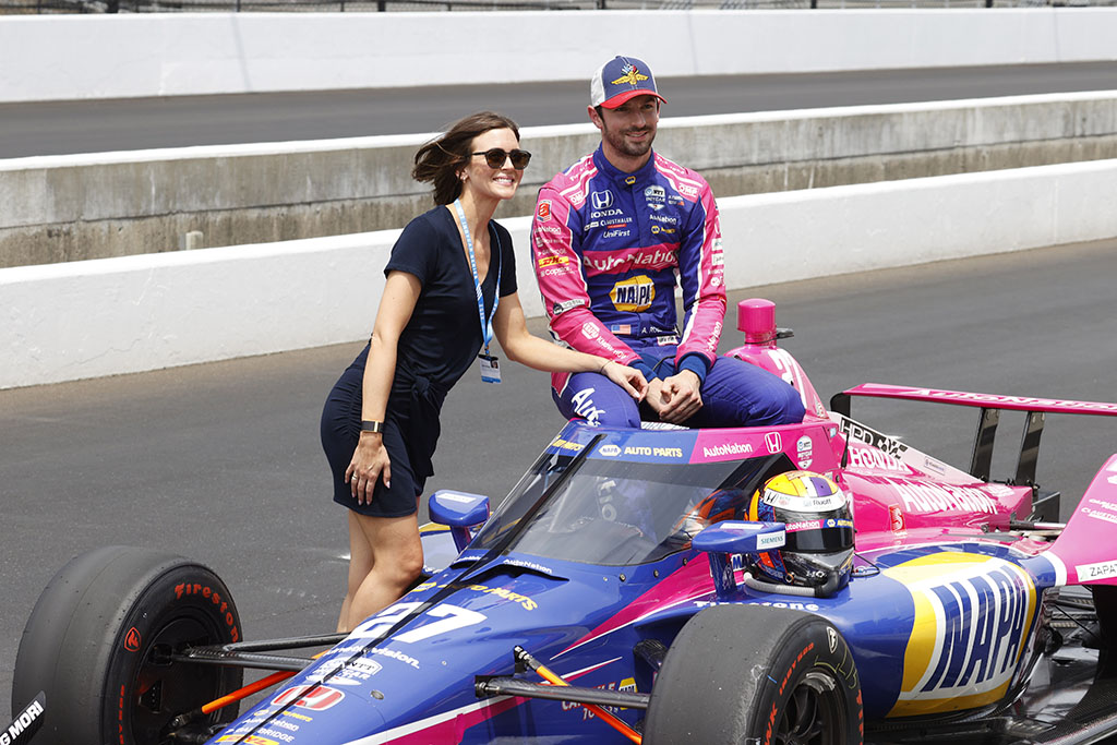 NTT IndyCar driver Alexander Rossi poses for a photo with his girlfriend Kelly Mossop on May 21st, 2022 after qualifying for the 106th running of the Indianapolis 500 at the Indianapolis Motor Speedway in Indianapolis, Indiana. (Photo by Brian Spurlock/Icon Sportswire via Getty Images)