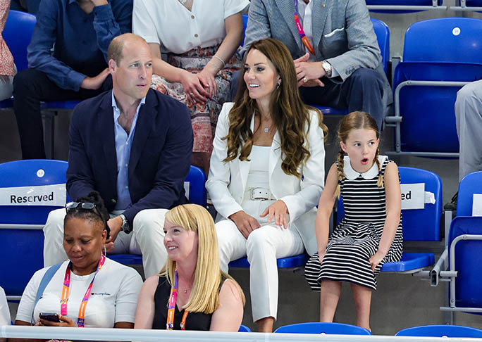 BIRMINGHAM, ENGLAND - AUGUST 02: Prince William, Duke of Cambridge, Catherine, Duchess of Cambridge and Princess Charlotte of Cambridge attend the Sandwell Aquatics Centre during the 2022 Commonwealth Games on August 02, 2022 in Birmingham, England. (Photo by Chris Jackson/Getty Images)