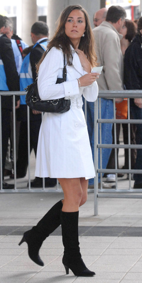 kate middleton in 2000s at princess diana concert with white dress black bag and black boots
