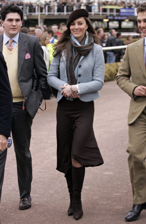 kate middleton at an event wearing a pink cropped jacket and floral dress