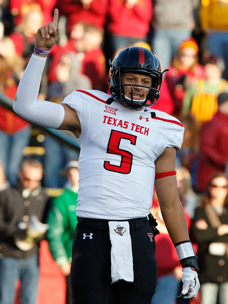 AMES, IA - NOVEMBER 22: Quarterback Patrick Mahomes in texas tech jersey #5 of the Texas Tech Red Raiders signals a play at the line of scrimmage in the first half of play against the Iowa State Cyclones at Jack Trice Stadium on November 22, 2014 in Ames, Iowa. Texas Tech defeated Iowa State 34-31. (Photo by David Purdy/Getty Images)