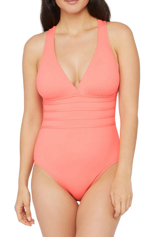 Model wears one-piece swimsuit for sale at Nordstrom Rack.