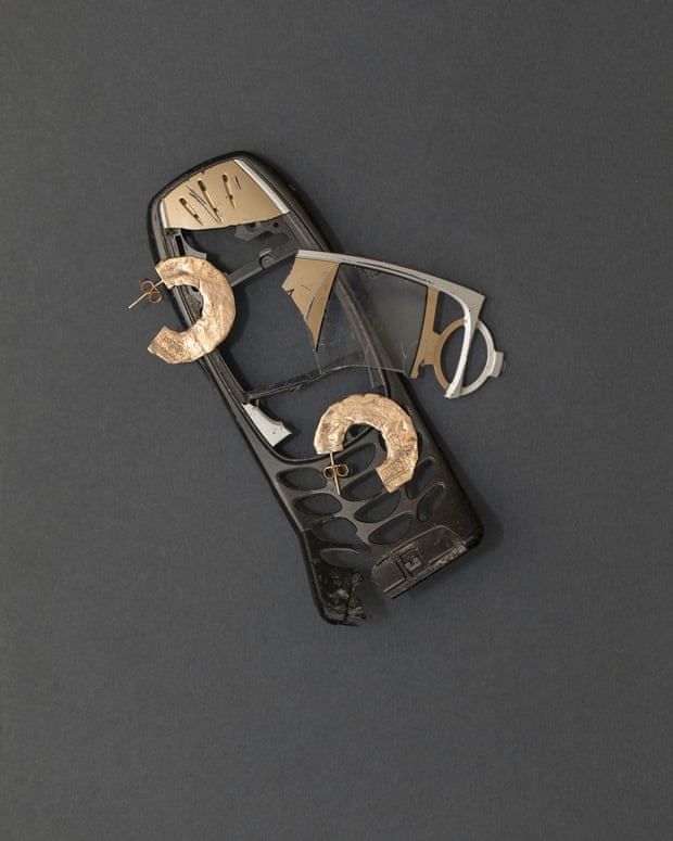 Lylie earrings pictured with a mobile phone used as source material