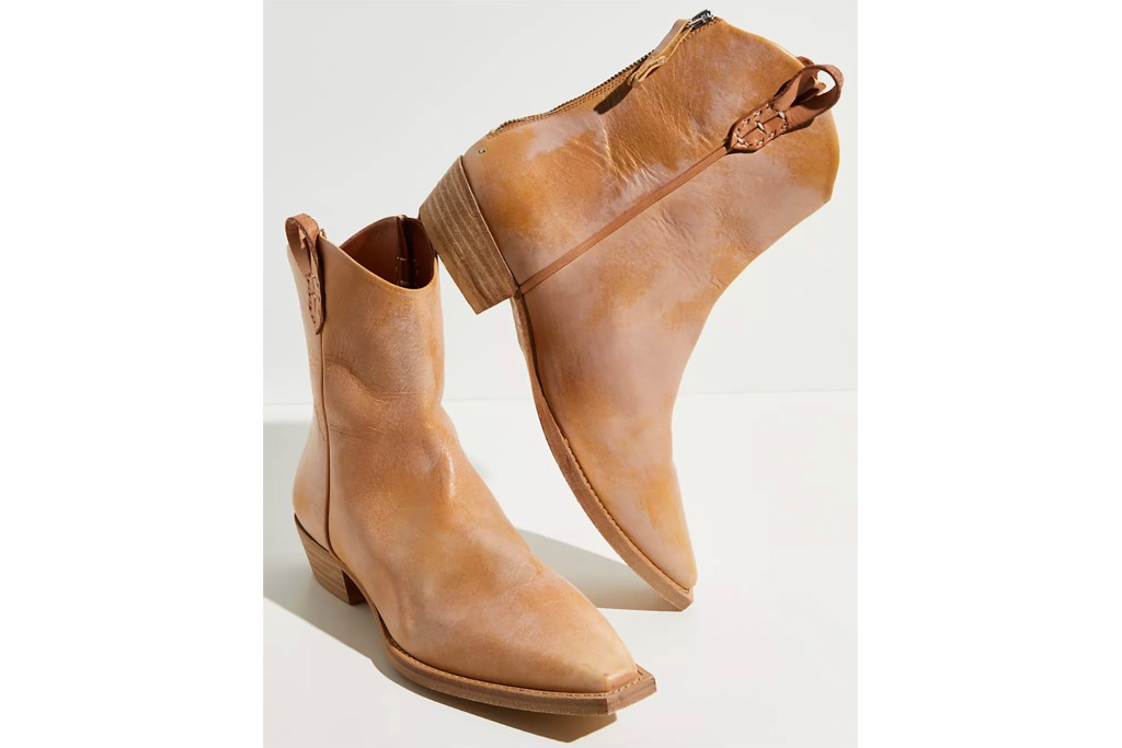 A pair of brown western style booties 