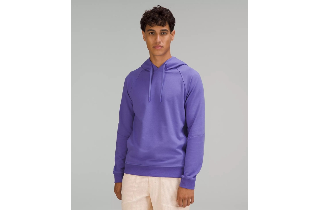 A man in a purple sweatshirt 
