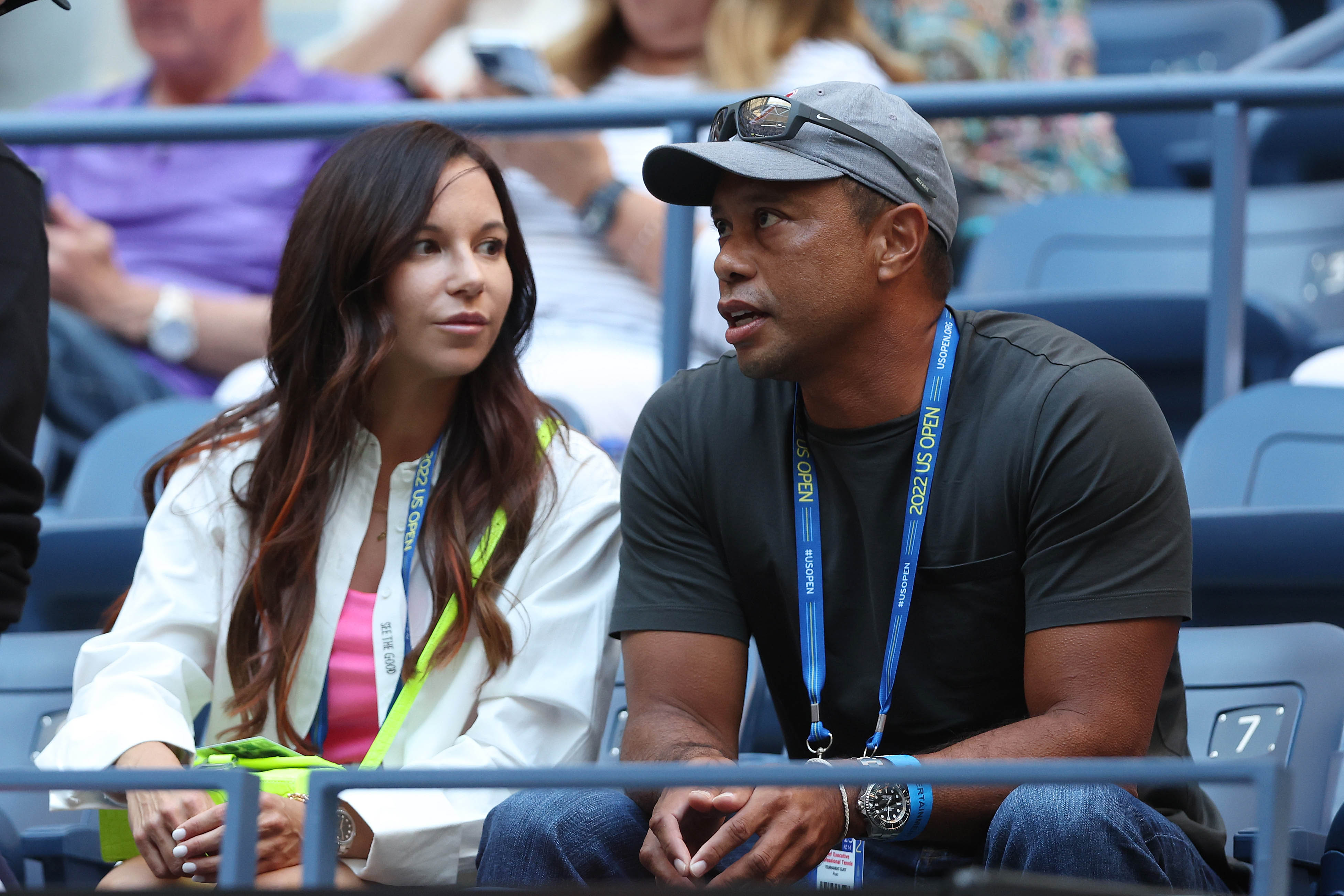 Erica Herman and Tiger Woods look on prior to a match at the 2022 US Open at USTA Billie Jean King National Tennis Center on August 31, 2022 in Queens, New York City. 