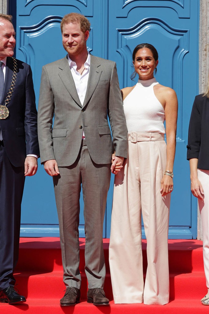 DUSSELDORF, GERMANY - SEPTEMBER 06: Prince Harry, Duke of Sussex and Meghan, Duchess of Sussex arrive at the town hall during the Invictus Games Dusseldorf 2023 - One Year To Go events, on September 06, 2022 in Dusseldorf, Germany. The Invictus Games is an international multi-sport event first held in 2014, for wounded, injured and sick servicemen and women, both serving and veterans. The Games were founded by Prince Harry, Duke of Sussex who's inspiration came from his visit to the Warrior Games in the United States, where he witnessed the ability of sport to help both psychologically and physically. (Photo by Chris Jackson/Getty Images for Invictus Games Dusseldorf 2023)