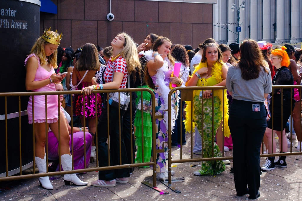 Party City near MSG has sold out of boas, an employee told The Post on Wednesday. Here, a sea of fans in boas wait for entry to "Harry's House."
