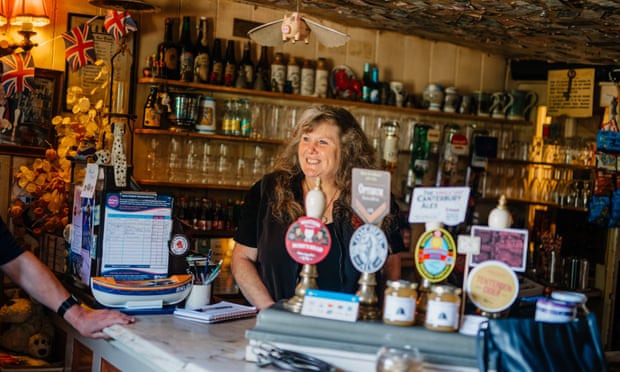 Kate, daughter of former landlady Doris Jemison, behind the bar inside the Red Lion.