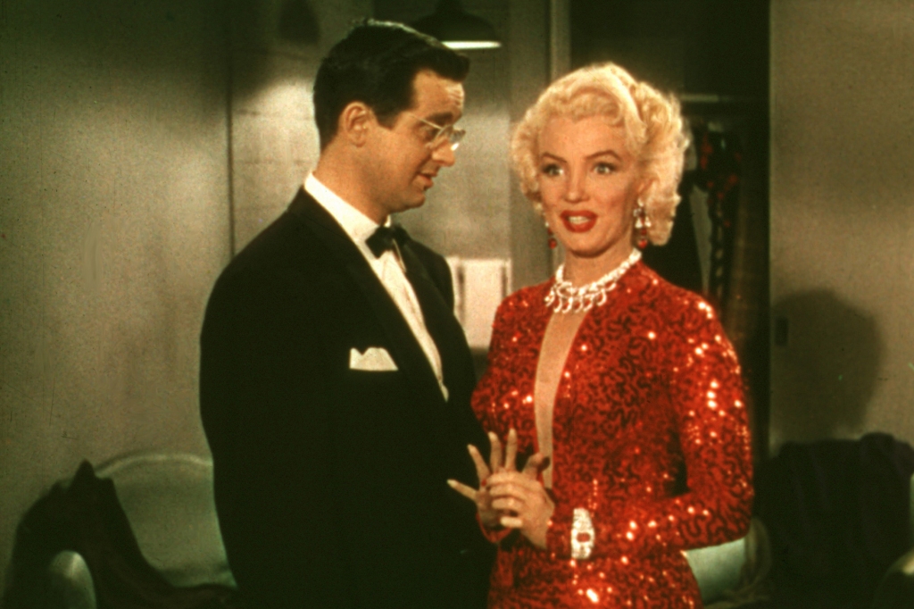 Actress Marilyn Monroe and actor Elliot Reed on the set of the film "Gentlemen Prefer Blondes' in December 1952.