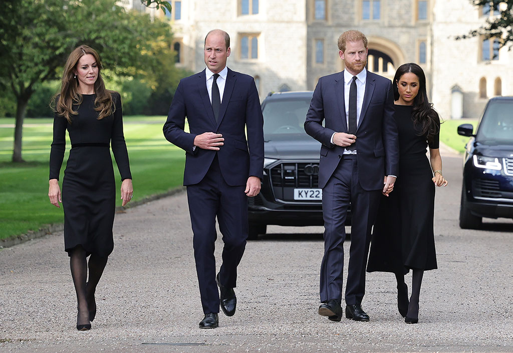 Catherine, Princess of Wales, Prince William, Prince of Wales, Prince Harry, Duke of Sussex, and Meghan, Duchess of Sussex on the long Walk at Windsor Castle arrive to view flowers and tributes to HM Queen Elizabeth on September 10, 2022 in Windsor, England. 