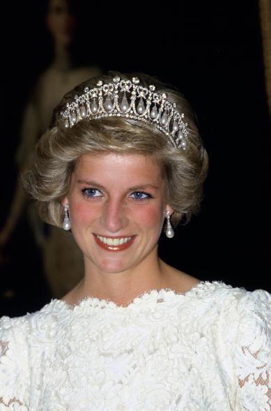In 1985, Diana, Princess of Wales, wore the Cambridge Knot Tiara to an event at the British Embassy in Washington, DC. The tiara, which was on loan from her mother-in-law, Queen Elizabeth, is made of diamonds and 19 hanging pearls all set in both silver and gold. However, when Diana and Charles, Prince of Wales, divorced, Diana gave the tiara back, as noted by one of the terms of her settlement.