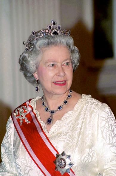 Queen Elizabeth II has worn the Belgian Sapphire tiara on several occasions, including a 1988 banquet at Prague Castle in the Czech Republic. Though most of Her Majesty's tiaras were inherited, few were purchased. This sapphire and diamond tiara formerly belonged to Princess Louise of Belgium, who married Prince Ferdinand Philipp of Saxe-Coburg and Gotha in 1875. She had numerous affairs, leading to the couple's divorce — which left her in such enormous debt that she had to sell her jewelry. Queen Elizabeth II bought one of the Princess' tiaras in the early 1950s.