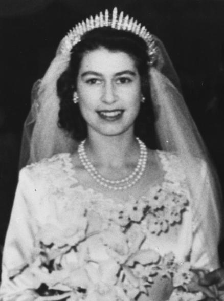 For her 1947 wedding to Prince Philip, Duke of Edinburgh, Princess Elizabeth wore Queen Mary's Russian Fringe tiara, which was made in 1919. The diamond accented piece can be worn as a necklace too.