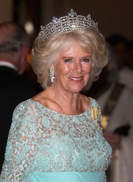 Another diamond-encrusted tiara that the Queen Mother inherited from Dame Margaret Greville is this diadem with its famous honeycomb pattern. The Queen Mother increased the height of the piece with a row of brilliant-cut diamonds and one marquise-cut diamond. Queen Elizabeth II's daughter-in-law, Camilla, wore the tiara to the annual Commonwealth Heads of Government Meeting (CHOGM) in 2013.