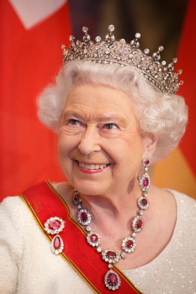 Girls of Great Britain and Ireland, a committee headed by Lady Eva Greville, gifted the namesake tiara to Queen Mary in 1893 as a wedding present. She regifted it to her granddaughter, then Princess Elizabeth (later Queen Elizabeth II), for her own wedding in 1947. Here, Queen Elizabeth II wore the tiara to a state dinner in 2015.