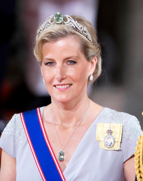 The Countess of Wessex's aquamarine tiara can be worn on her head or around her neck, making it one of the royal collection's many convertible pieces. She wore it for the first time in 2005 and again to Prince Carl Philip, Duke of Värmland's wedding to Sofia Hellqvist in 2015.