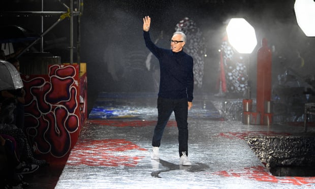 Tommy Hilfiger on the rainy runway.