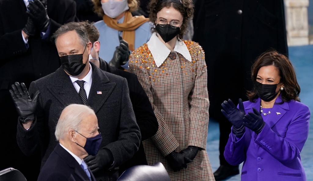 Ella Emhoff (background center) with her stepmother, Vice President Kamala Harris, and her father Doug Emhoff as President-elect Joe Biden arrives for the 59th Presidential Inauguration at the U.S. Capitol in Washington, on, Jan. 20, 2021. 