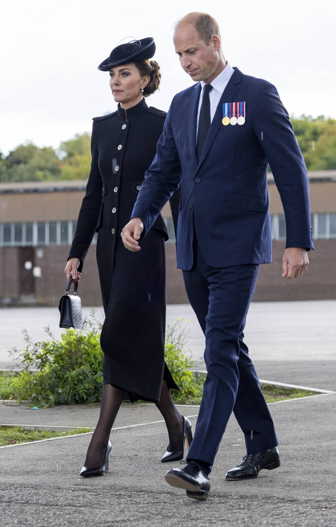 Prince William, Prince of Wales and Catherine, Princess of Wales meet with military personnel during a visit to Army Training Centre Pirbright on September 16, 2022 in Guildford, England.