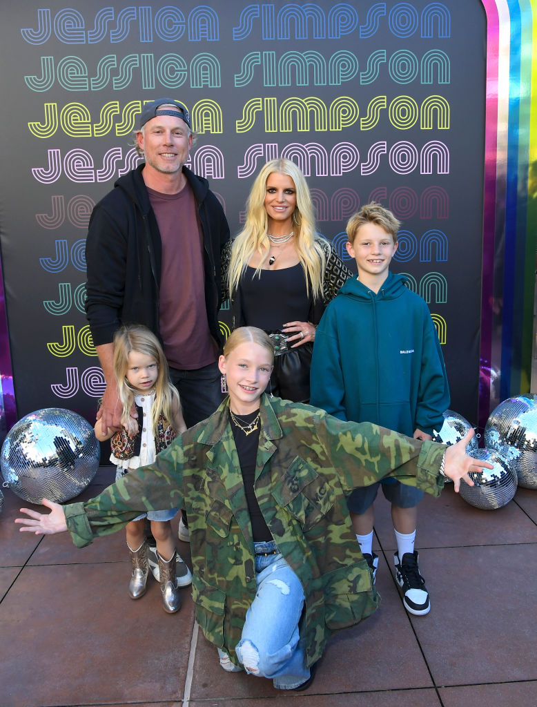 LOS ANGELES, CALIFORNIA - SEPTEMBER 24: Birdie Mae Johnson, Eric Johnson, Jessica Simpson, Ace Knute Johnson and Maxwell Drew Johnson celebrate the launch of Jessica Simpson's Fall Collection with fans and a special performance by the LA Roller Girls at Nordstrom at The Grove on September 24, 2022 in Los Angeles, California. (Photo by Charley Gallay/Getty Images for Jessica Simpson Collection)