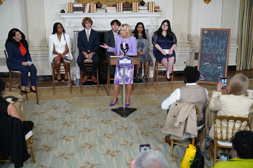(L-R) Poet Ada Limon, students Emily Igwike, Winslow Hastie, Jr., Jesse Begay, Vidhatrie Keetha and Diane Sun listen to First Lady Jill Biden speak during an event in honor of the Class of 2022 National Student Poets Program, in the State Dining Room of the White House in Washington, DC on September 27, 2022. (Photo by Mandel NGAN / AFP) (Photo by MANDEL NGAN/AFP via Getty Images)
