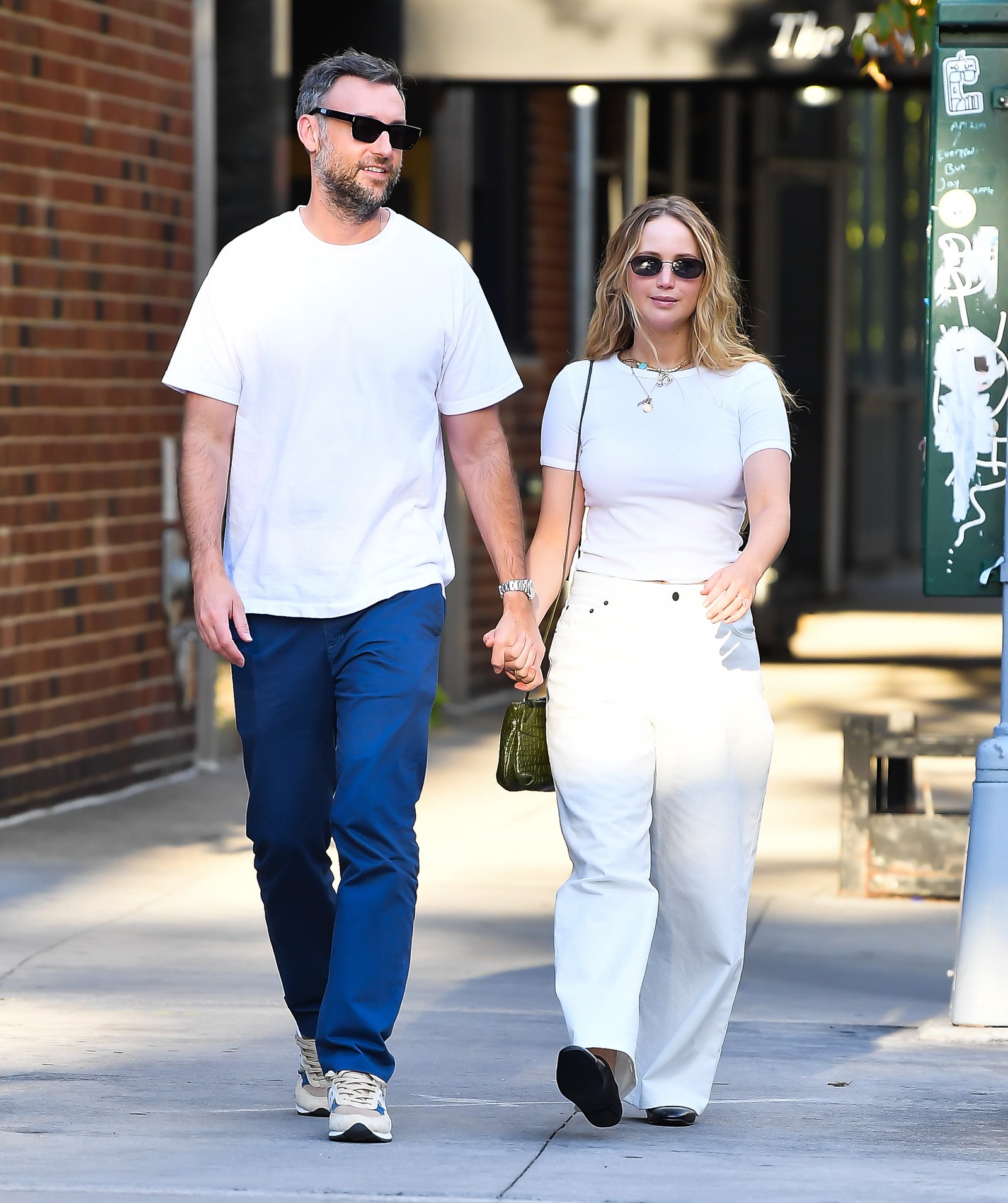 Image may contain Clothing Apparel Human Person Footwear Jennifer Lawrence Shoe Sunglasses and Accessories