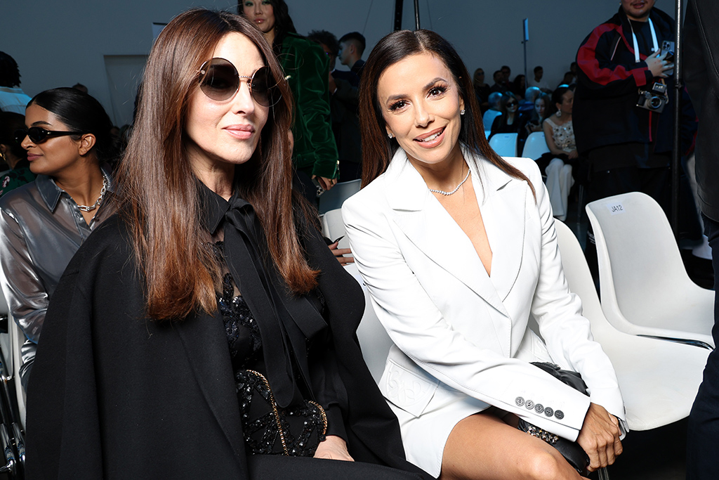 Monica Bellucci and Eva Longoria attend the Elie Saab Womenswear Spring/Summer 2023 show as part of Paris Fashion Week on October 01, 2022 in Paris, France. 