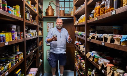 Shelf life: Dick in the pantry he built to store jams and chutneys made with produce from their walled garden.