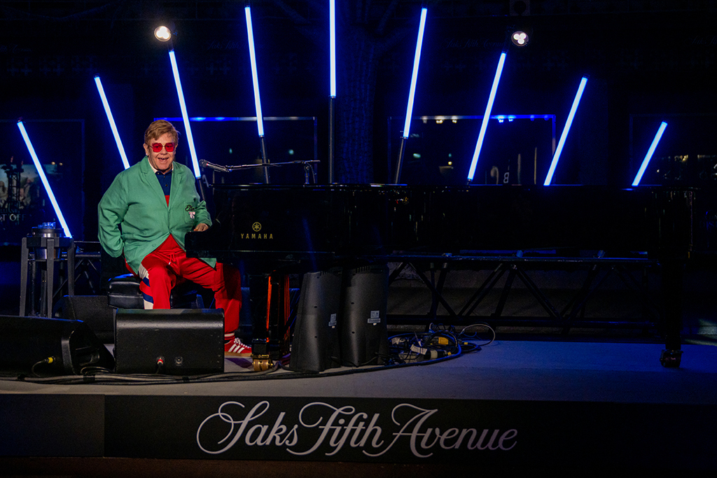 Sir Elton John performs in the opening ceremony for Saks Fifth Avenue’s Holiday Windows and Light show on Nov. 22, 2022 in New York.