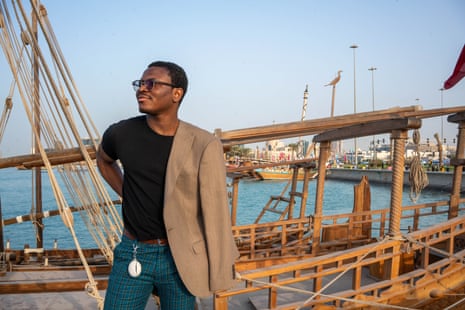 Migrant worker Francis Grey from Lagos on the waterfront in Doha showing off his fashion sense.