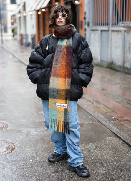 Influencer Lea Naumann wearing a multicolored scarf by Acne Studios during Copenhagen Fashion Week