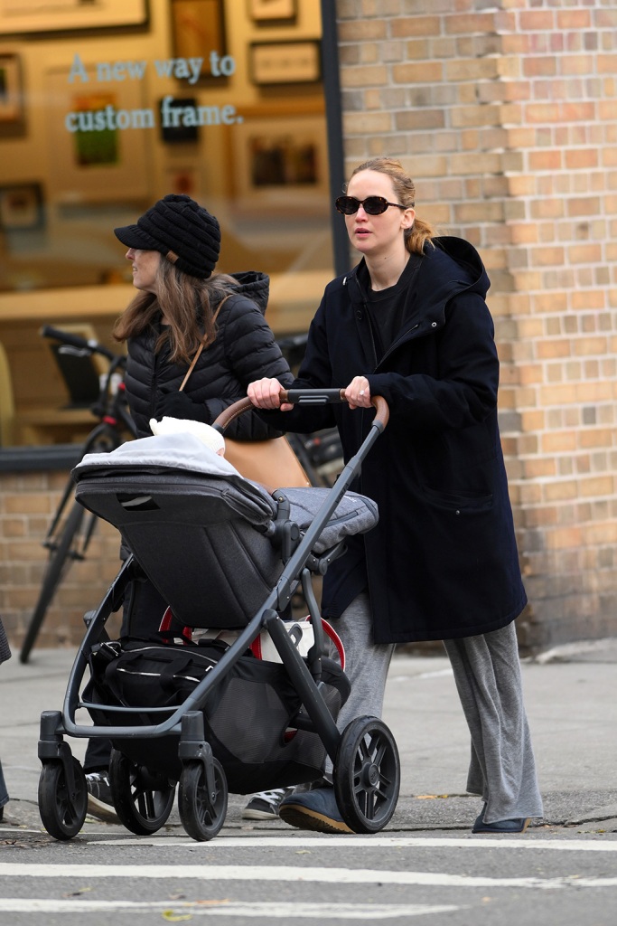 Jennifer Lawrence pushing her son in a stroller taking a stroll in New York on Nov. 28, 2022.